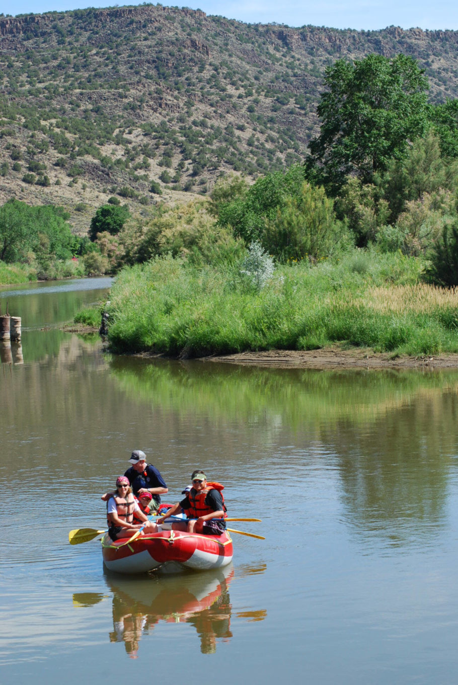 Family floating near orilla verde recreation area Family floating near orilla verde recreation area