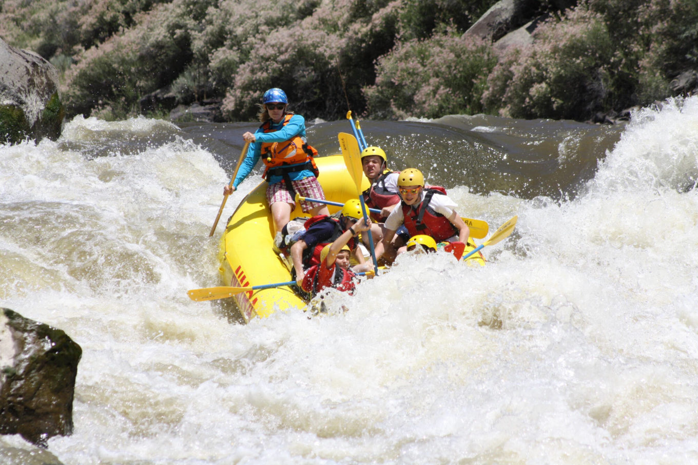 River Guide on the Taos Box rapids with family River Guide on the Taos Box rapids with family